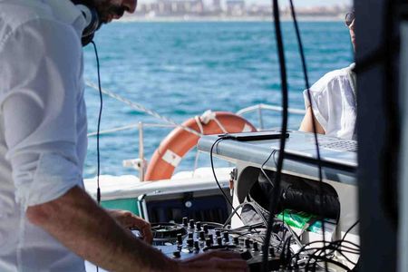Catamaran party cruise with a DJ from Altea