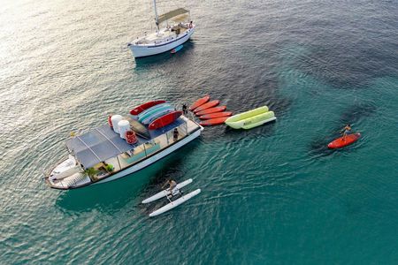 Boat Tour with Tapas, Open Bar and Water Sports in Ibiza