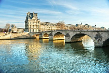 City tour of Paris by bus and tickets for a Seine cruise