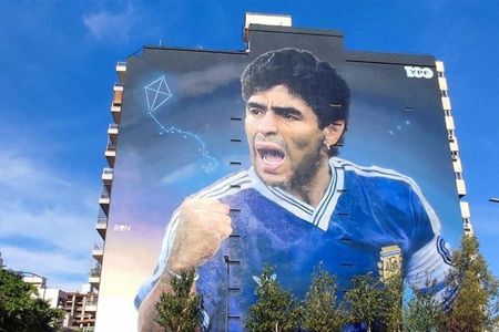 Messi and Maradona Argentine football legends graffiti tour