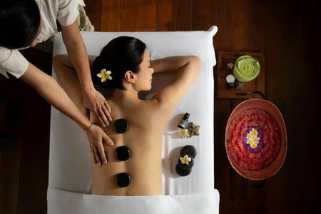 1.5-hour warm stone spa experience at Maya Sanur Spa