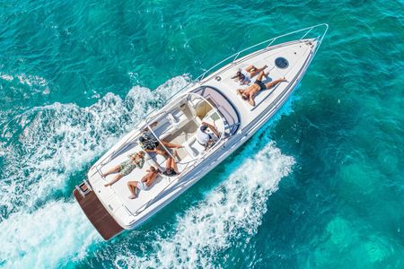 Half-day private cruise to Ibiza's stunning beaches from San Antonio
