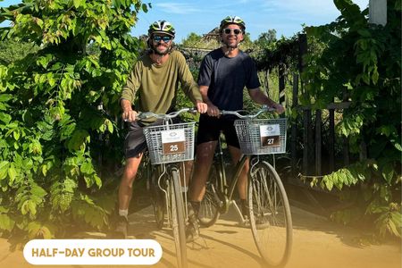 Half-day Kim Bong eco tour by bicycle and bamboo boat ride