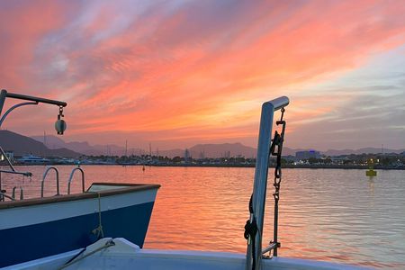 Sunset boat trip in Alcudia Bay with tapas and snorkelling