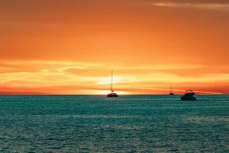 Private sailing catamaran cruise with meal in Santorini