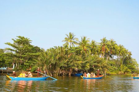 Boat tour on the Cổ Cò River with traidtional snack