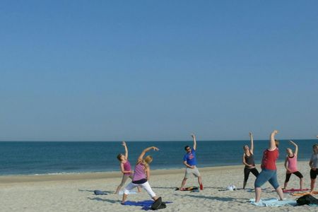 Yoga session on the beach of the island of Sylt