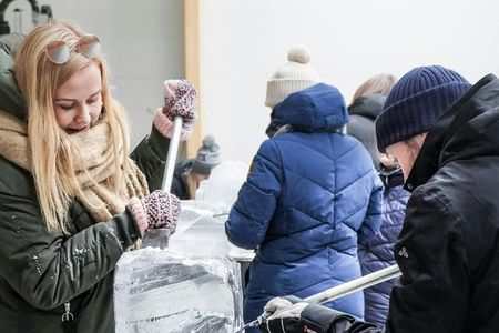 Ice sculpting workshop and dinner by the fire in Rovaniemi