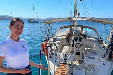 Morning half-day private yacht cruise in Milos