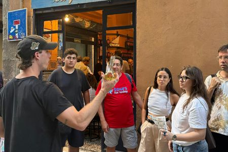 Barcelona district tour with traditional tapas tasting
