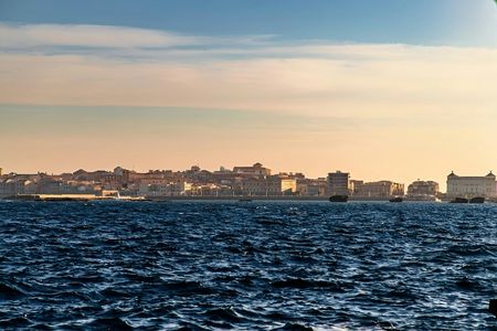 Ortigia coastline exploration by private boat with seafood appetisers