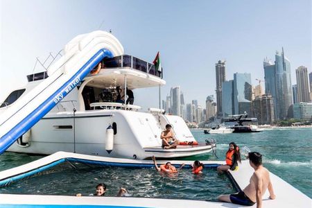 Yacht sailing with waterslides and BBQ from Dubai Harbour