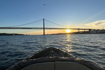 Lisbon sunset cruise with traditional buffet and open bar