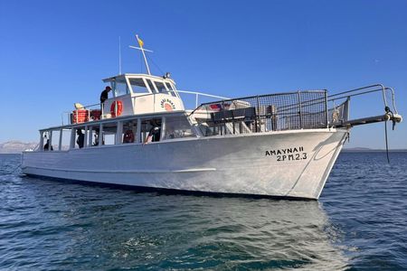 Sunset boat trip in Alcudia Bay with tapas and snorkelling