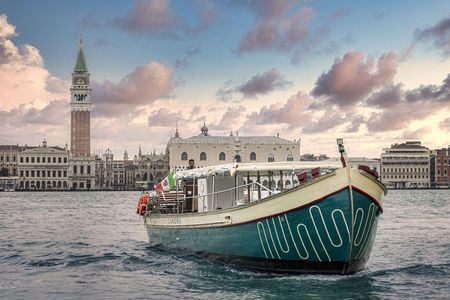 Murano, Burano and Torcello, the Venetian lagoon on a traditional boat