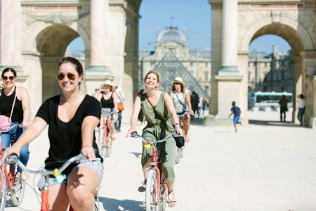 Paris highlights bike tour and Seine river cruise