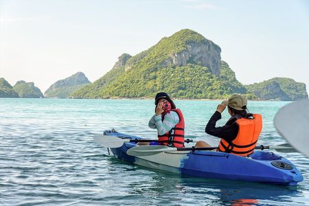 Kayaking, zipline, and cave tubing adventure in Vang Vieng
