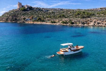 Cagliari small-group boat escape to Sella del Diavolo with swim stops