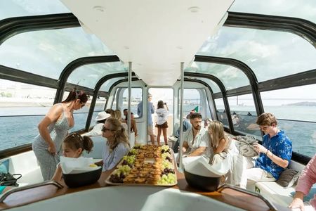 Lisbon morning cruise with coffee and Portuguese snacks