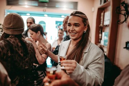 Kraków social bar tour with 1-hour open bar and karaoke