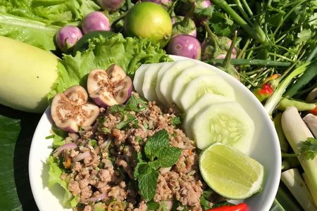 Lao cooking class on a Mekong River boat with market visit