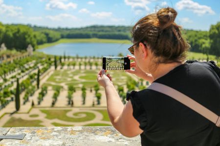 Palace of Versailles audio-guided tour with transport from Paris