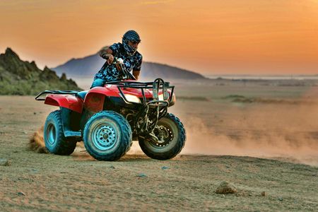 Premium quad bike adventure with Bedouin food and tea from Sharm