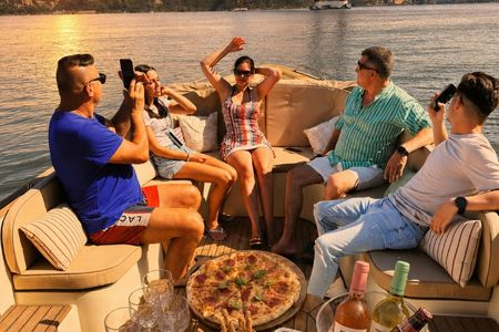Tagus River sunset boat cruise with open bar and snacks