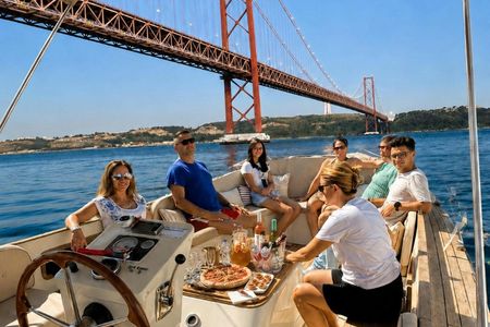 Lisbon morning boat cruise with coffee and Portuguese snacks
