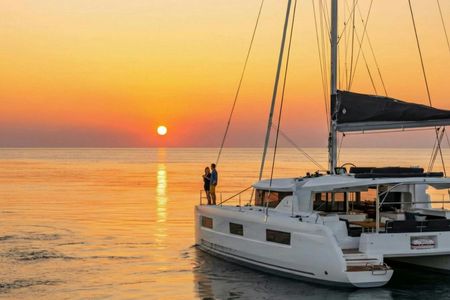 Santorini catamaran cruise with BBQ and drinks from Vlychada Marina