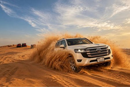 Desert safari with sandboarding and dinner from Dubai