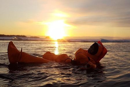 Midnight Sun Floating Experience in Forest Lake