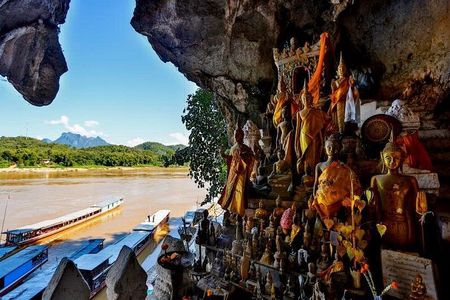 Bike to Pak Ou Caves and boat trip back to Luang Prabang City full day