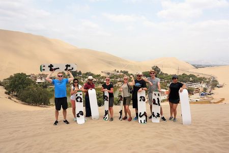 Dune buggy & Sandboarding around Huacachina Oasis & Ballestas Islands day tour