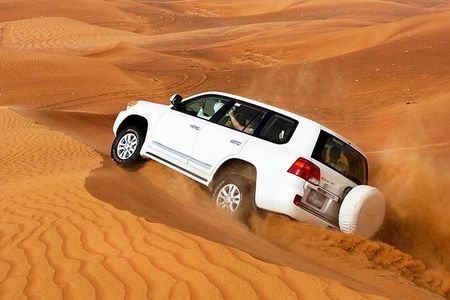 Golden Dunes & Sunset Safari with BBQ, Camel Ride & Sandboarding