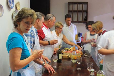 Cooking class, visit to the wine cellar, 2500 year old granaries