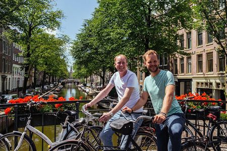 Amsterdam PRIVATE Bike Tour With Locals: Bike & Local Snack Included 