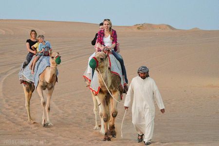 Thrilling Morning Red Dune Desert Safari with Camel Ride in Dubai