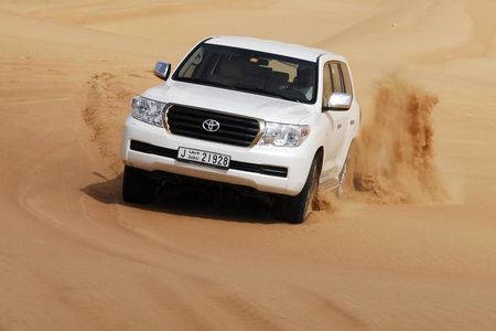 Premium Red Dune Desert Safari,BBQ dinner, camel ride, live show at Majilis camp