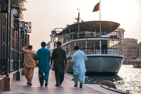 Old Dubai Walking Tour: Abra ride, Creek, Spice & Gold Souks.