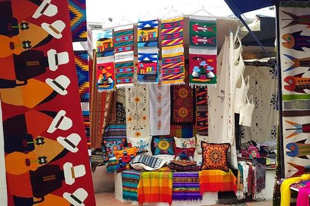 Otavalo Market & Peguche Falls Tour with Bizcochos – From Quito