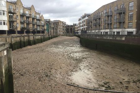 Historic walk of East Londons Wapping Docks and its famous Pubs