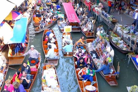 Explore Thailand’s Floating Market with Paddle Boat Adventure