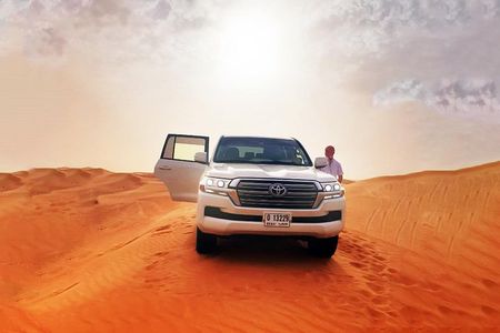 Morning Desert Safari with 4x4 Dune bashing, Camel Ride and Sandboarding