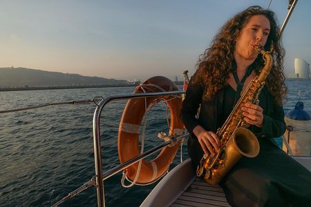 Sunset Sailing Experience with Live Sax Music and Spanish Tapas