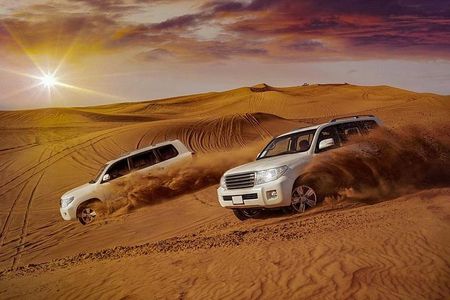 Evening Desert Safari with Camel Ride, BBQ Dinner and Dune Bashing