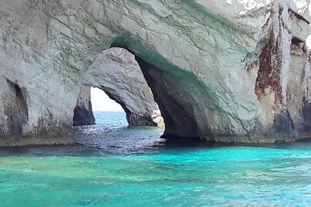 From St Nikolaos port: Boat cruise to navagio shipwreck beach and blue caves