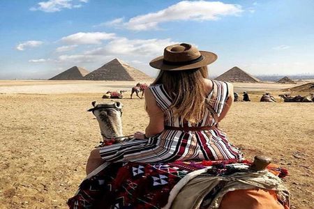 Private Experienced Tour for Camel ride during the sunset with Local Bedouin Dinner