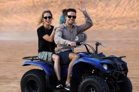 Red Dunes by Quad Bike with VIP Camp, Camels, Sandboarding & Falcon