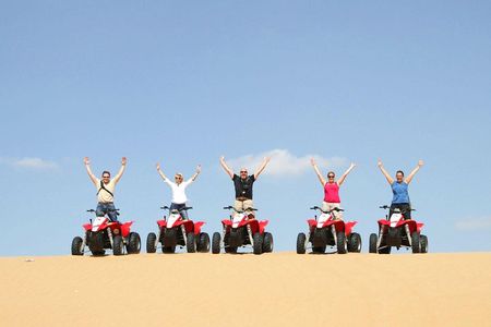 Dubai Red Dunes Safari by Quad Bike, Sand boarding, Camel Ride & BBQ Dinner